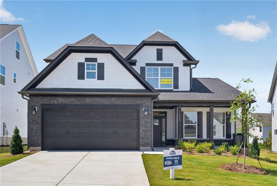 Front exterior of a new home in Twin Lakes, Hoschton, GA, highlighting curb appeal (Image 2).