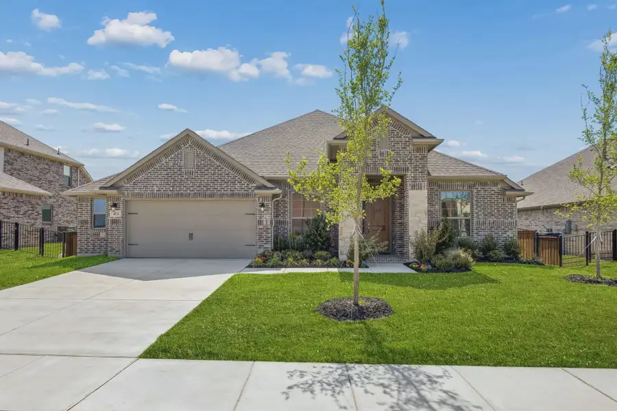 Front exterior of a new home in Silo Mills, Joshua, TX, highlighting curb appeal (Image 1). Front exterior of a new home in Silo Mills, Joshua, TX, highlighting curb appeal (Image 1).
