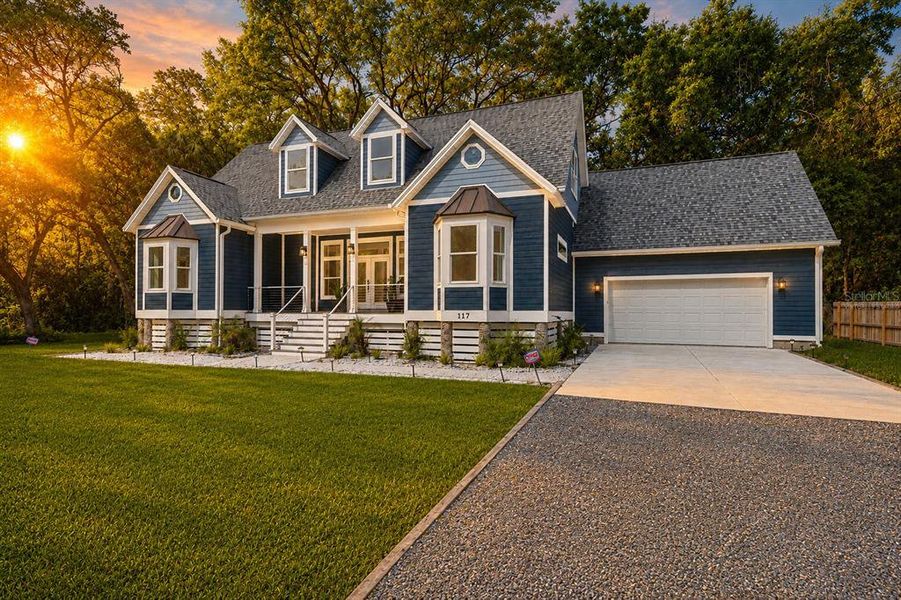 Front exterior of a new home in , Palm Coast, FL, highlighting curb appeal (Image 28). Front exterior of a new home in , Palm Coast, FL, highlighting curb appeal (Image 28).
