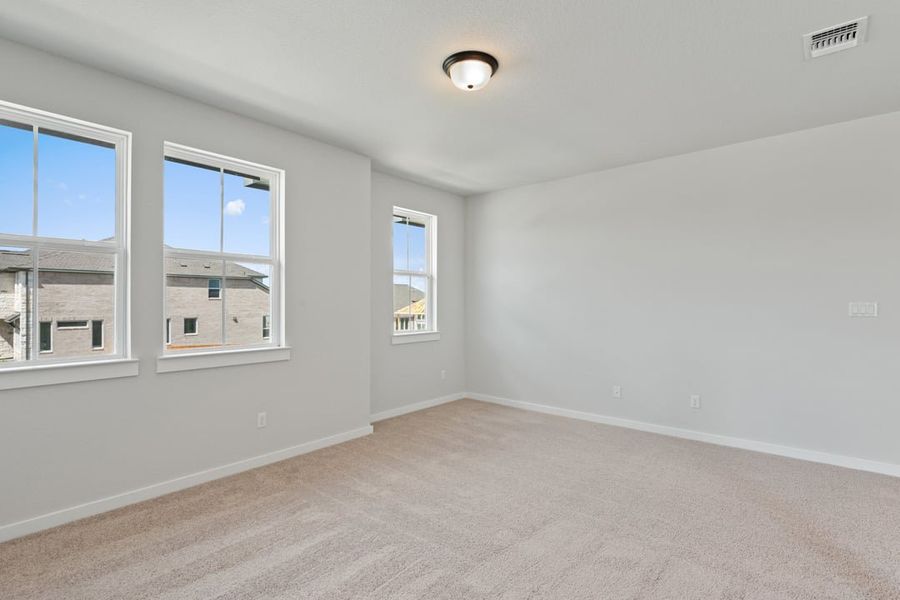 Spacious, unfurnished interior of a new home in Capitol Collection at Lariat, Liberty Hill (Image 35).