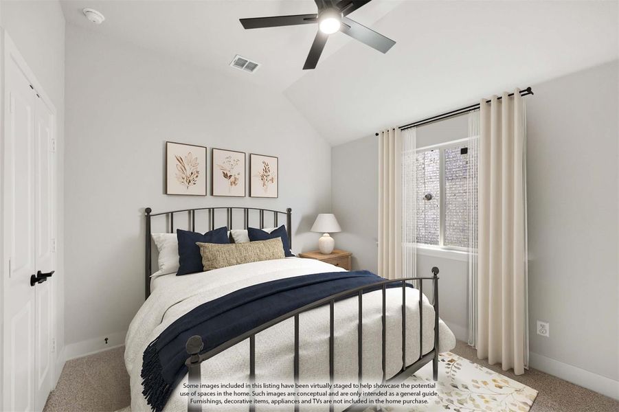 Bedroom with vaulted ceiling, metal bed frame, ceiling fan, and large window with curtains