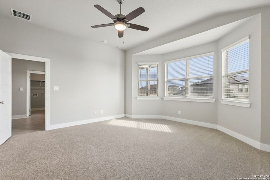 Spacious, unfurnished interior of a new home in Legendary Trails - Premier Series, Cibolo (Image 40).