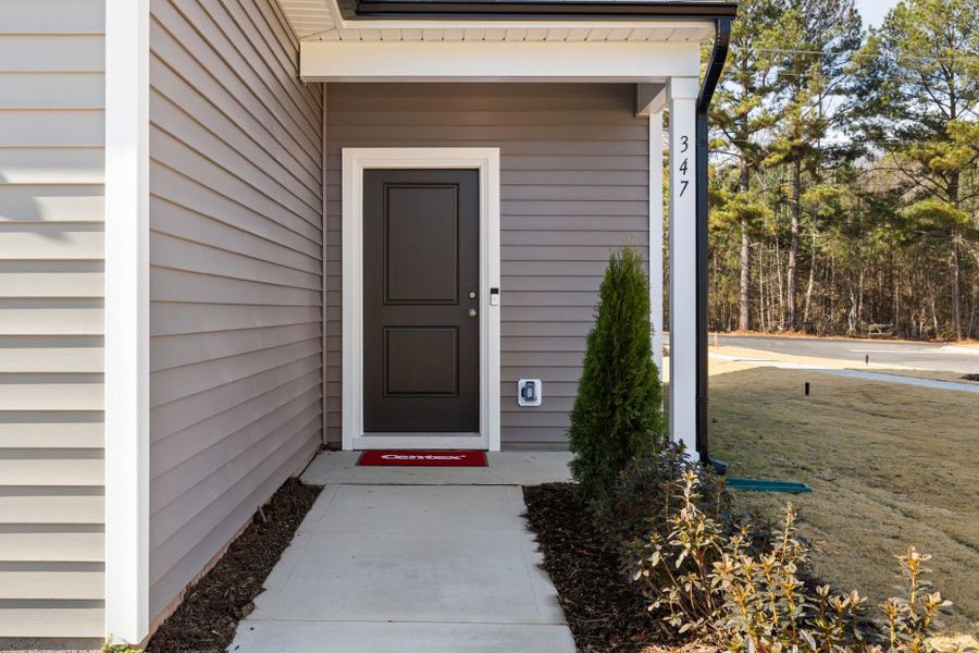 Exterior details and patio area of a home in Westford, Sanford (Image 4).