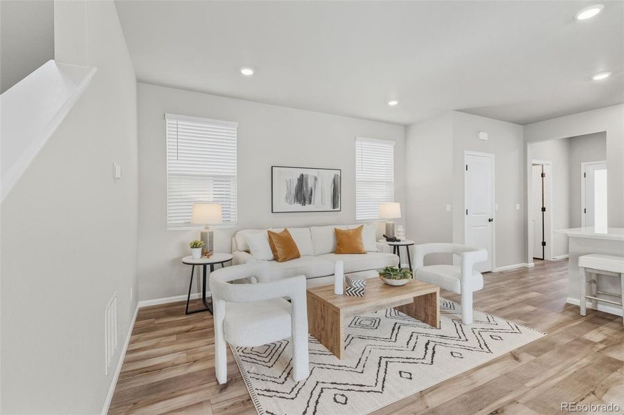 Furnished interior view inside a new home in Woodrose at Painted Prairie, Aurora (Image 12).