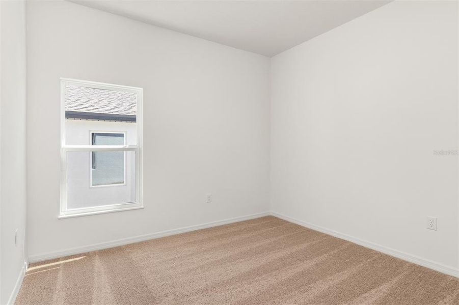 Spacious, unfurnished interior of a new home in Peach Crossings, Winter Haven (Image 18).