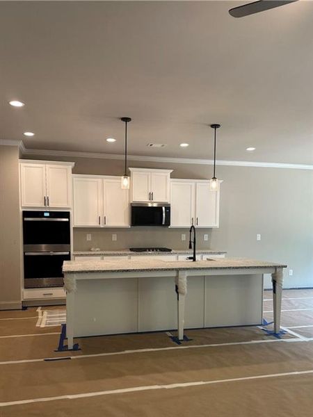 Furnished interior view inside a new home in , Covington (Image 3).