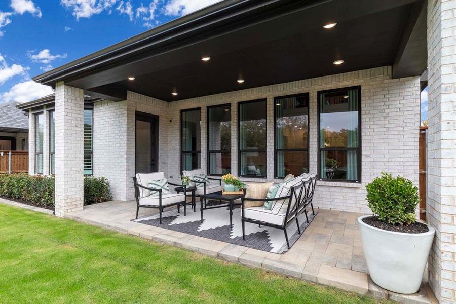 Exterior details and patio area of a home in Gateway Village - The Reserve, Denison (Image 20).