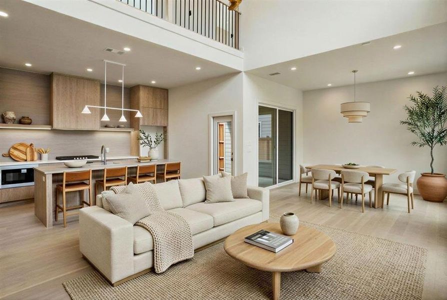 Photos have been virtually staged to show potential furnishings and décor. The property is sold unfurnished, and no furniture conveys.