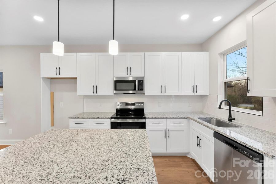 Furnished interior view inside a new home in , Hickory (Image 8).