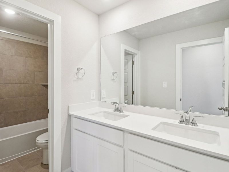 Furnished interior view inside a new home in Royal Crest, San Antonio (Image 10).