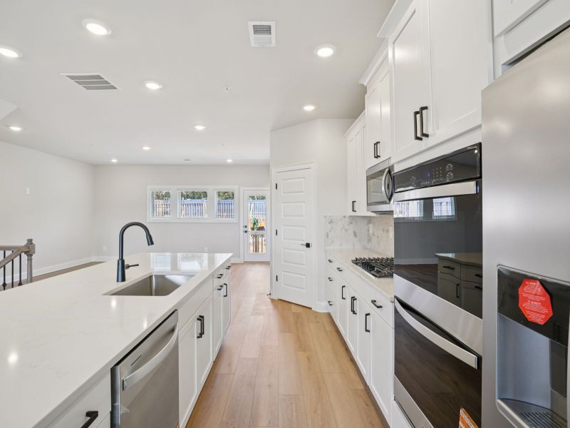 Furnished interior view inside a new home in Martin Springs - Highland Series, Lawrenceville (Image 6).