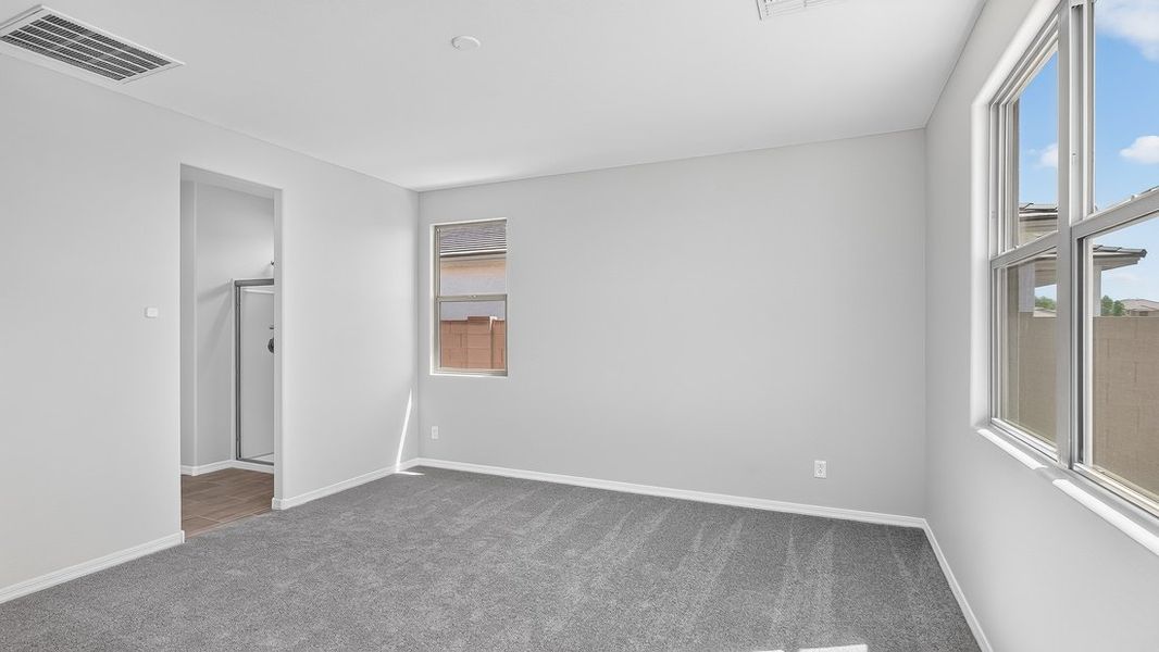 Spacious, unfurnished interior of a new home in Artisan at Asante, Surprise (Image 18).