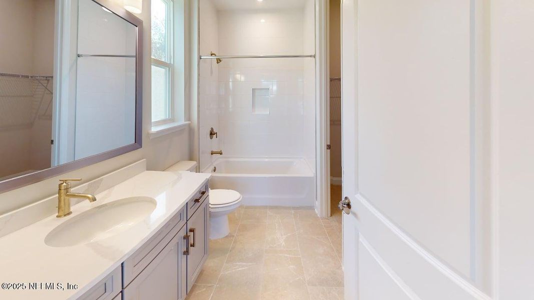 Furnished interior view inside a new home in RiverTown - WaterSong, St. Johns (Image 7).