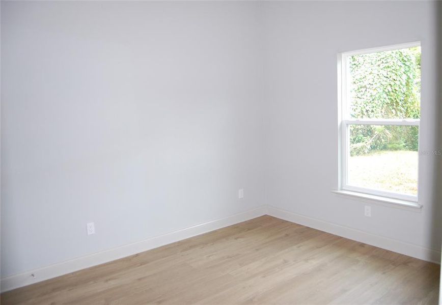 Spacious, unfurnished interior of a new home in , New Smyrna Beach (Image 11).