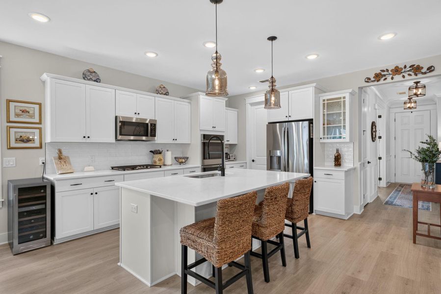 Furnished interior view inside a new home in K. Hovnanian's® Four Seasons at Lakes of Cane Bay, Summerville (Image 13).