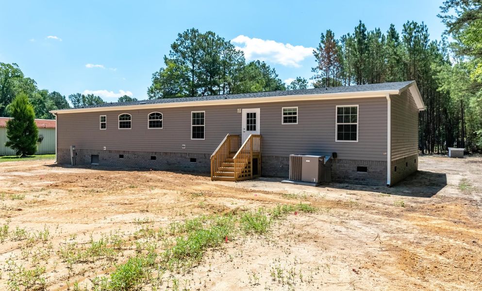 Exterior details and patio area of a home in , Pineville (Image 22). Exterior details and patio area of a home in , Pineville (Image 22).