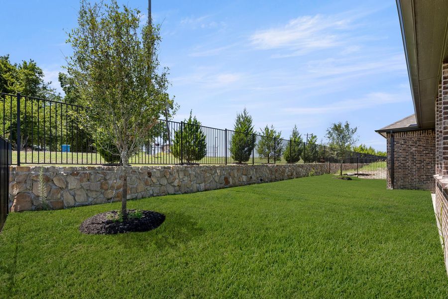 Exterior details and patio area of a home in Nelson Lake Estates, Rockwall (Image 19). Exterior details and patio area of a home in Nelson Lake Estates, Rockwall (Image 19).