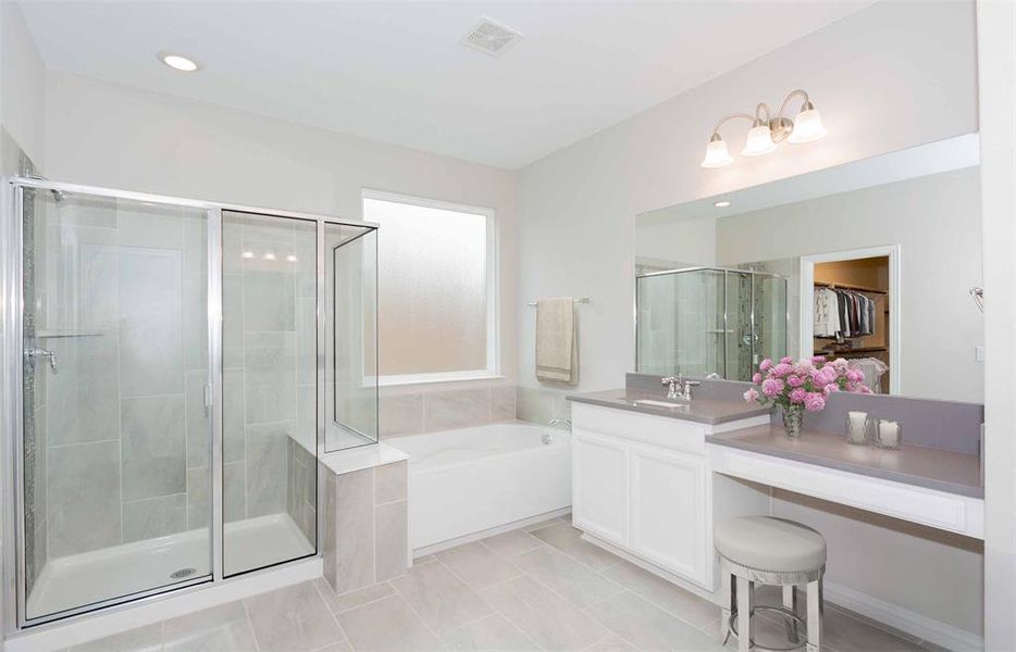 Owner's bath with dual vanity and oversized shower  *Photos of furnished model. Not actual home. Representative of floor plan. Some options and features may vary