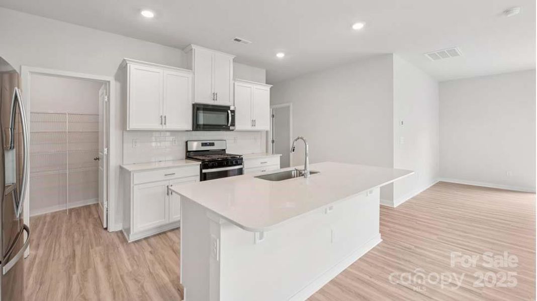 Furnished interior view inside a new home in Cardinal Creek, Charlotte (Image 3).