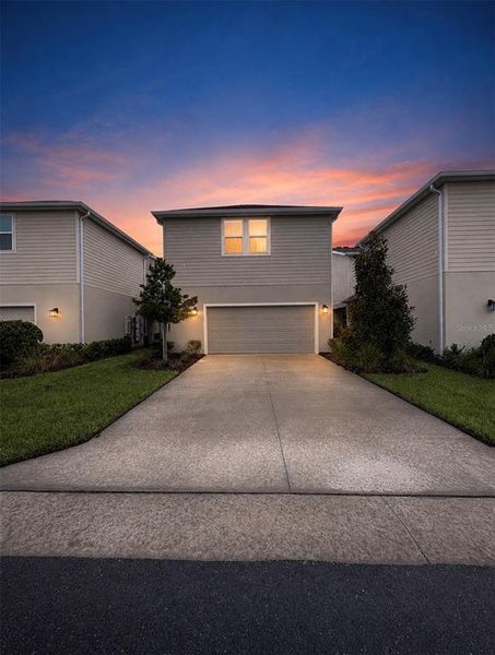 Front exterior of a new home in , St. Cloud, FL, highlighting curb appeal (Image 22).
