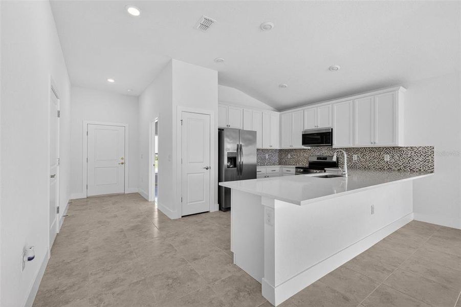 Furnished interior view inside a new home in , Port Charlotte (Image 7). Furnished interior view inside a new home in , Port Charlotte (Image 7).