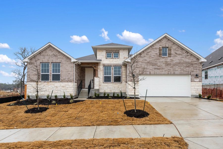 Representative exterior photo of a completed home built from the Carolina by Ashton Woods in Provence 70s, Austin, TX (Image 2).