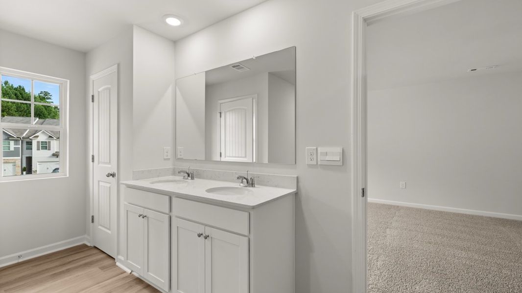 Representative furnished interior of a home built from the Salisbury by D.R. Horton in Waypoint, Flowery Branch (Image 9).