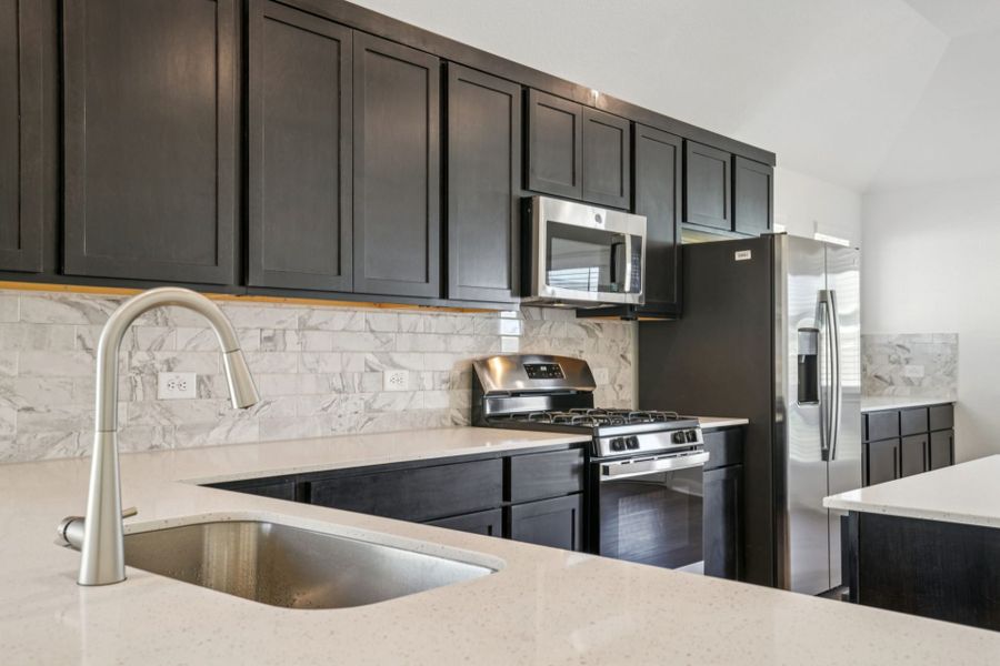 Furnished interior view inside a new home in Village at Three Oaks, Seguin (Image 6).