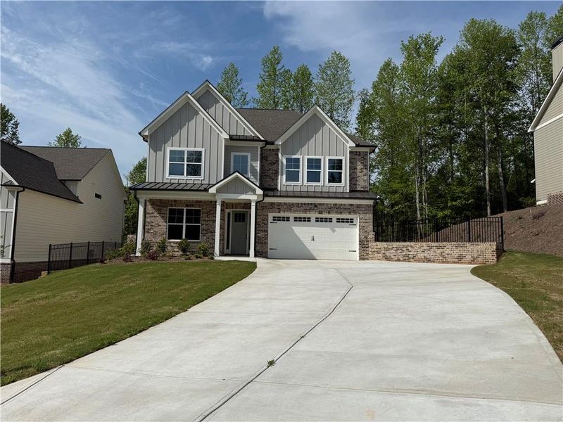 Front exterior of a new home in , Jefferson, GA, highlighting curb appeal (Image 1).