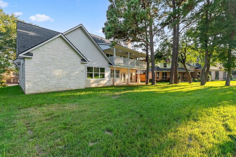 Stunning stone exterior encircles the entire home, offering timeless elegance front and back. Stunning stone exterior encircles the entire home, offering timeless elegance front and back.