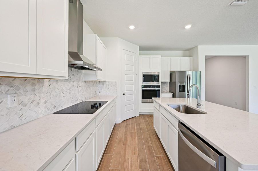 Furnished interior view inside a new home in Hampton Park - Signature Series, Vero Beach (Image 4).