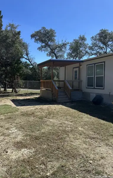 Exterior details and patio area of a home in , Lakehills (Image 26).