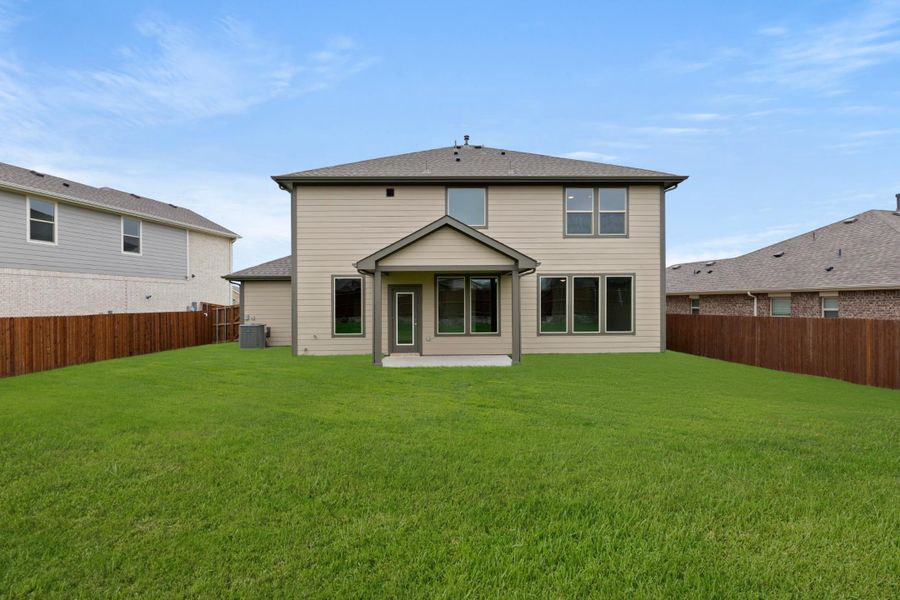 Front exterior of a new home in Waterscape, Royse City, TX, highlighting curb appeal (Image 15). Front exterior of a new home in Waterscape, Royse City, TX, highlighting curb appeal (Image 15).