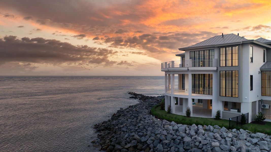 Front exterior of a new home in , Sullivan's Island, SC, highlighting curb appeal (Image 33).