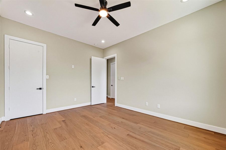 Third bedroom, featuring ample natural light and generous closet space. Third bedroom, featuring ample natural light and generous closet space.