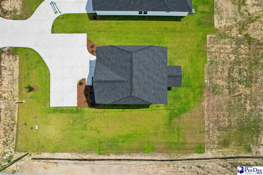 Front exterior of a new home in Southern Columns, Florence, SC, highlighting curb appeal (Image 30).
