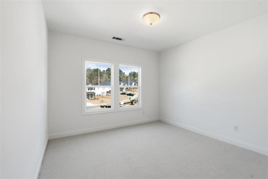 Spacious, unfurnished interior of a new home in , Woodstock (Image 22).