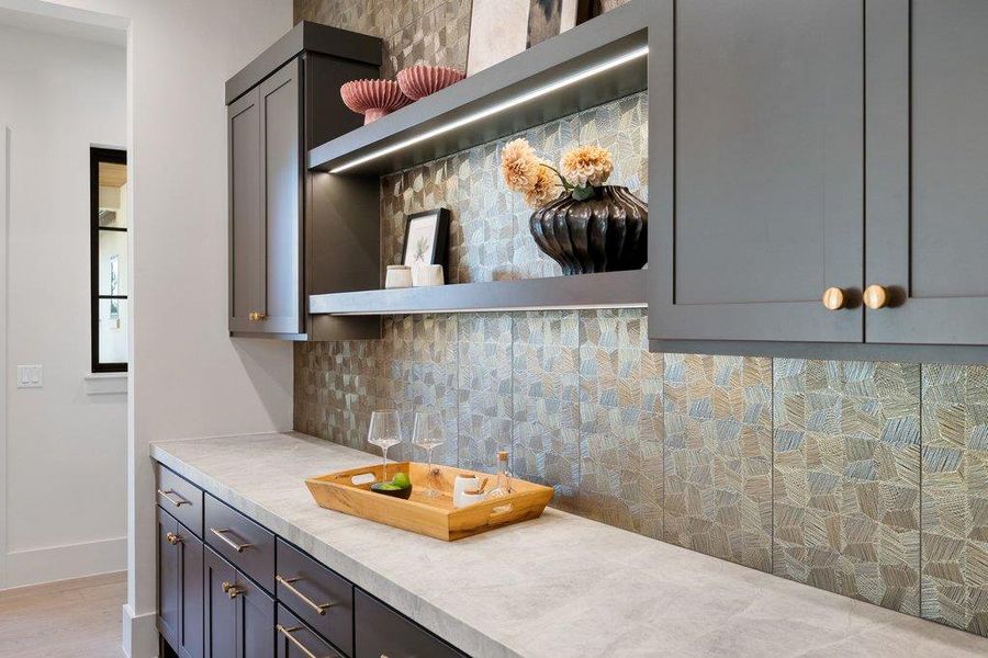 Complete with beverage refrigerator and ice maker. Complete with beverage refrigerator and ice maker.