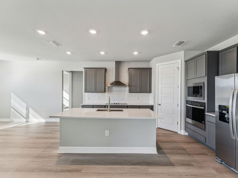 Furnished interior view inside a new home in Crescent Lakes - Signature Series, Punta Gorda (Image 6).