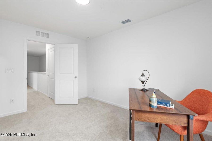 Furnished interior view inside a new home in Hardwick Farms: Hardwick Farms - Townhome Collection, Jacksonville (Image 6).