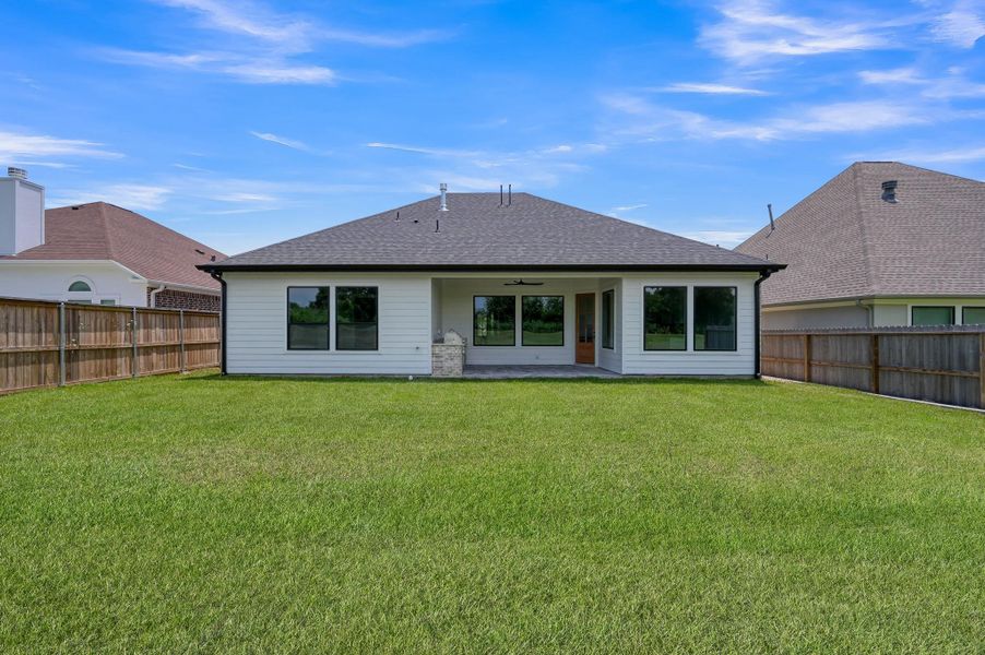 Expansive backyard with endless possibilities.
