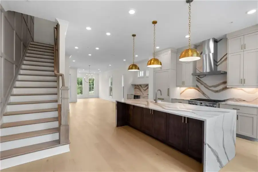RICH, TIMELESS AND ELEGANT ALL IN ONE!!  FINISHES ARE TRULY SPECTACULAR IN THIS ATTACHED RESIDENCE IN DOWNTOWN ALPHARETTA, A MUST SEE IN PERSON