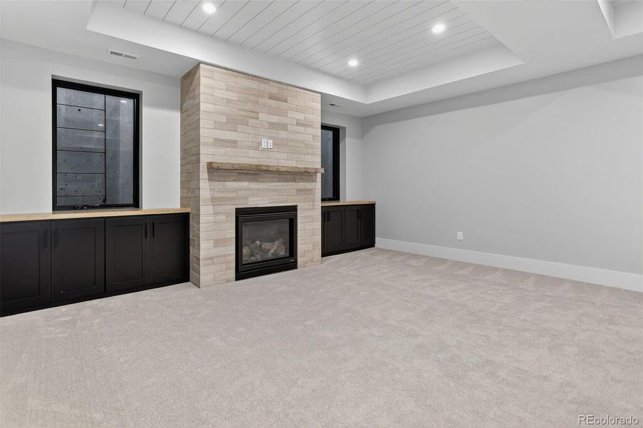 Basement Fireplace & Custom Built Ins