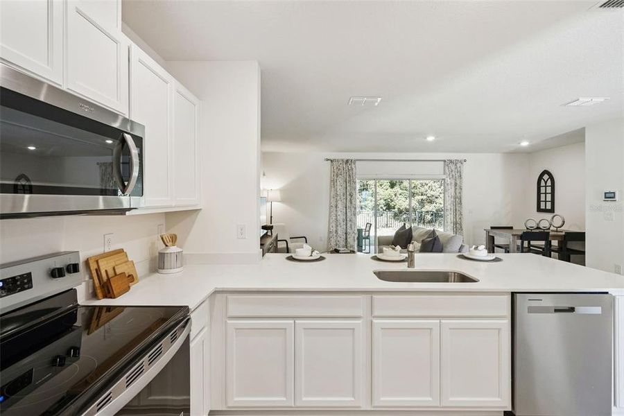 Furnished interior view inside a new home in Oak Pointe, Apopka (Image 10). Furnished interior view inside a new home in Oak Pointe, Apopka (Image 10).
