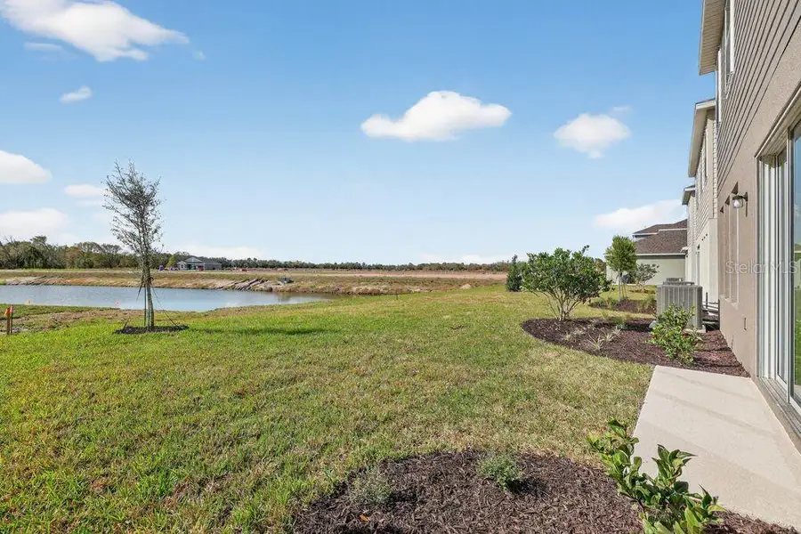 Exterior details and patio area of a home in Firethorn, Parrish (Image 22).