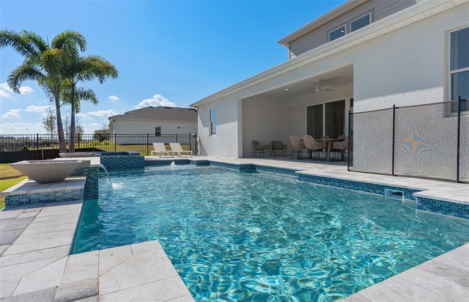 Exterior details and patio area of a home in Willow Ridge, Montverde (Image 25).