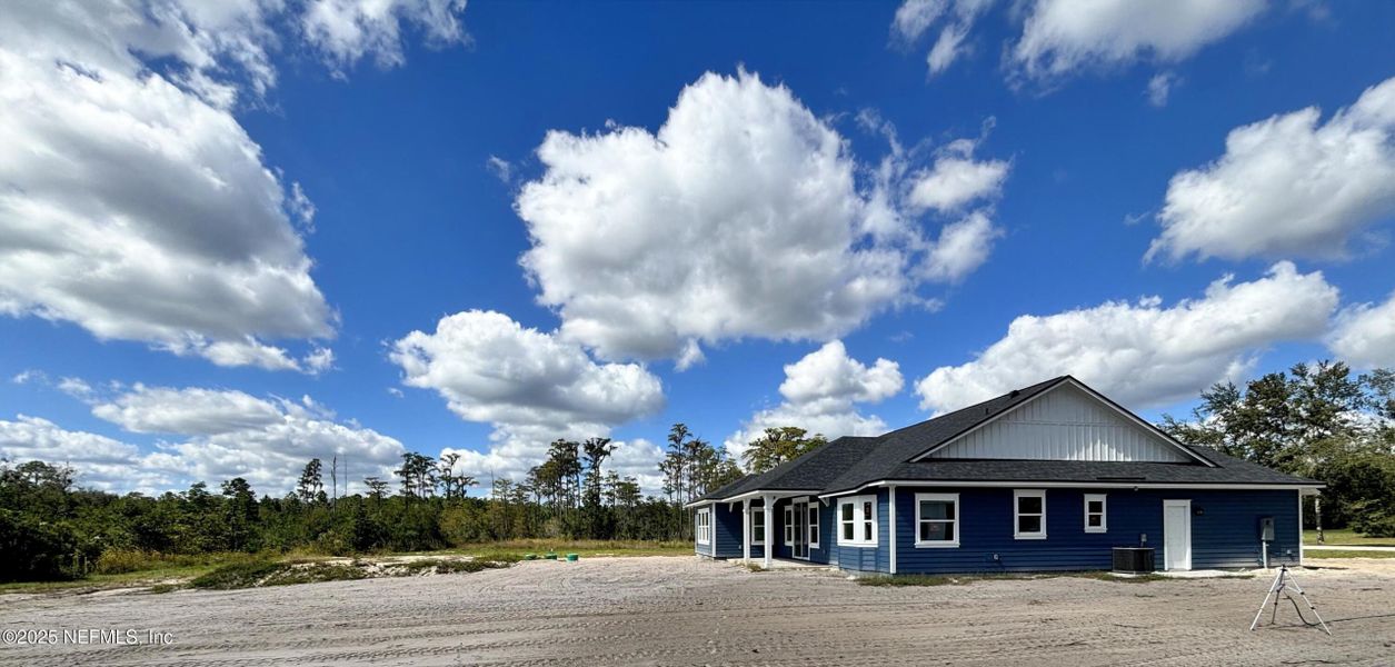 Front exterior of a new home in , Melrose, FL, highlighting curb appeal (Image 11).