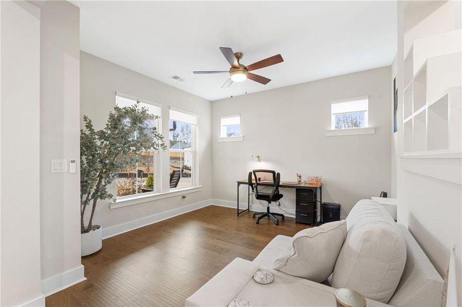 Furnished interior view inside a new home in Settingdown Farms, Cumming (Image 35).
