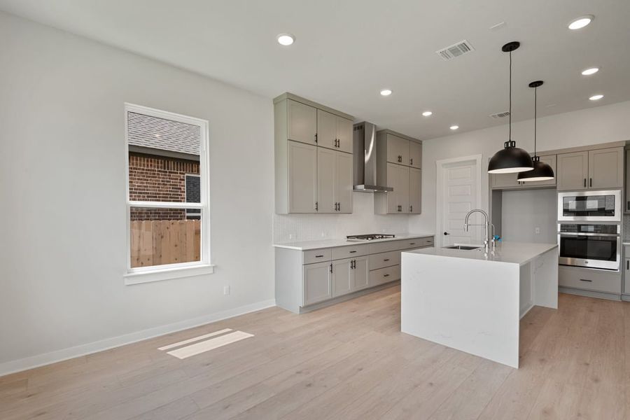 Furnished interior view inside a new home in Arbor Collection at Lariat, Liberty Hill (Image 6). Furnished interior view inside a new home in Arbor Collection at Lariat, Liberty Hill (Image 6).