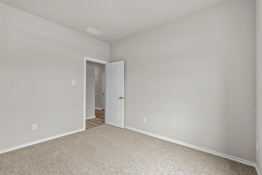 Spacious, unfurnished interior of a new home in Highlands at Chapel Creek, Fort Worth (Image 11).